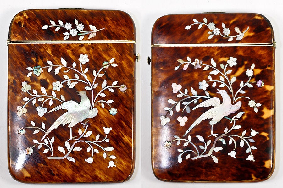 The height of elegance, the engraved marquetry of mother of pearl against the mottled chocolate to cognac coloration of the old tortoise shell is just stunning, and never more so than in this card case. A nice large-sized one, you'll be able to use