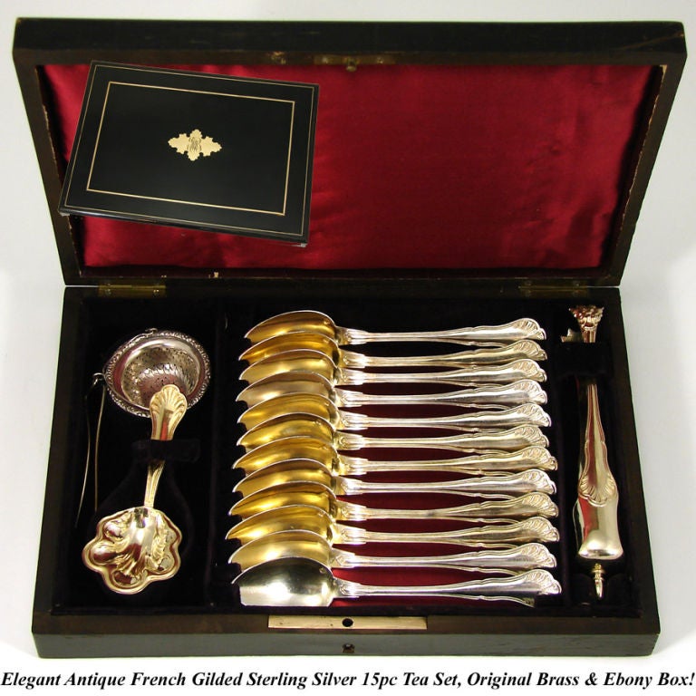 Fine antique French vermeil or gilded sterling silver Napoleon III era 15pc tea service or equipage consisting of twelve teaspoons, sugar tongs, tea scoop & strainer and all held in the original fitted ebony presentation box with brass inlay!