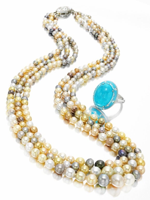 Three-row, Graduated Saltwater Pearl Necklace, with a marquise-shaped clasp, which is mounted with three old-European brilliant-cut, colorless diamonds, number of pearls 94, 96, 95, colors including iridescent tints of cream/white, yellow, orangish