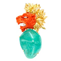 VERDURA A 'Roaring Lion' Coral and Emerald Brooch