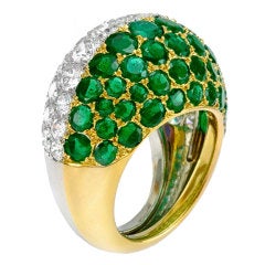 CARTIER An Emerald and Diamond Bombe Ring