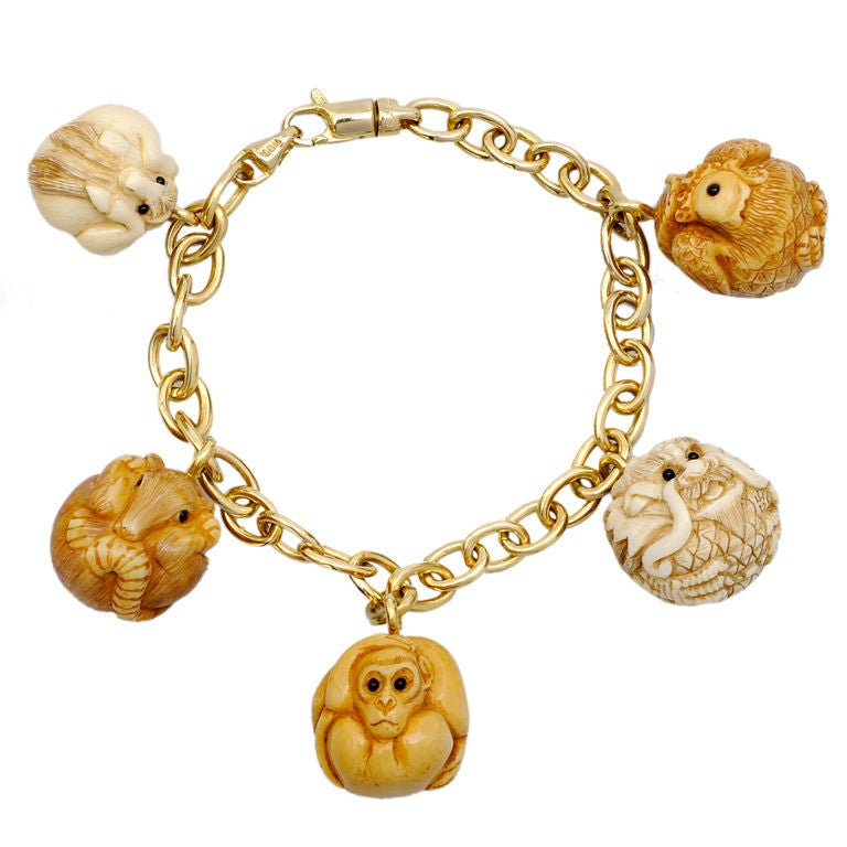 TAFFIN Mammoth Ivory and Gold Zodiac Charm Bracelet For Sale at 1stDibs