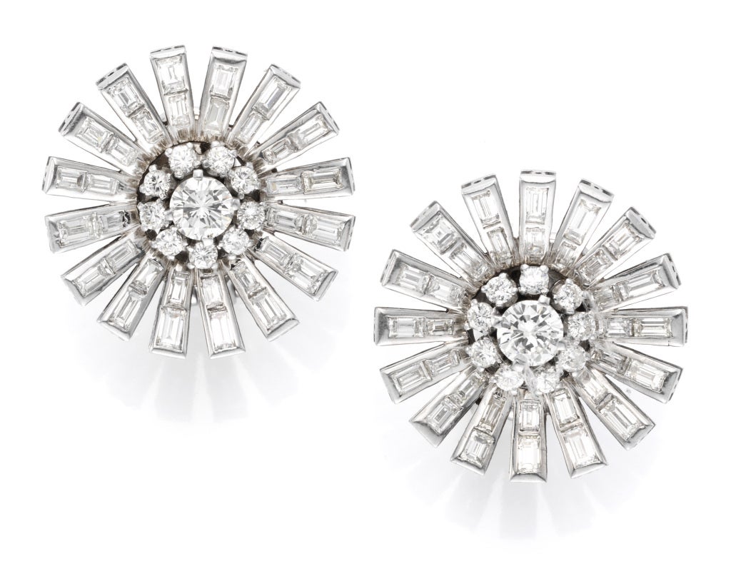 Paul Flato, A Pair of Diamond Ear Clips, each designed as a circular and baguette-cut diamond starburst, mounted in platinum, circa 1938, signed Paul Flato and a similar style is illustrated in the Paul Flato book.