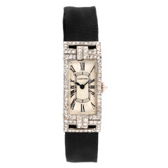CARTIER An Art Deco Diamond Platinum Wristwatch