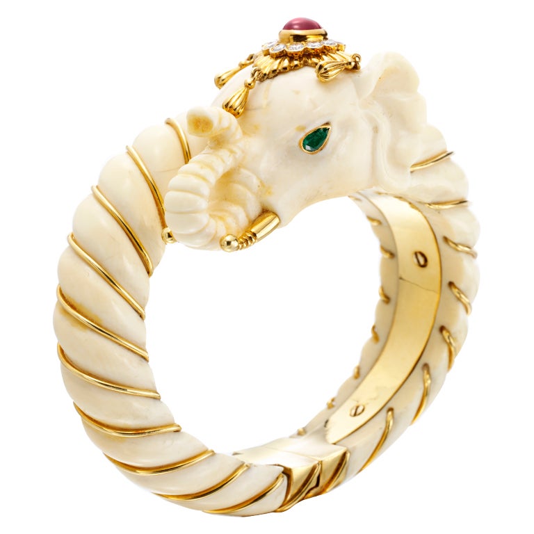 VAN CLEEF & ARPELS A Multi-Gem, Ivory and Gold 'Elephant' Bangle For Sale