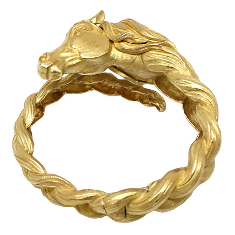 HERMES A Gold Horse Bangle Bracelet