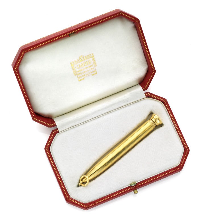 Cartier, A Telescope Pencil, called the telescopic bullet propelling pencil, of 18k yellow gold, signed Cartier Paris CG 23535, with  French marks, complete with original box.