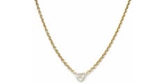 CARTIER A Diamond Solitaire and Yellow Gold Pendant Necklace