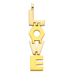 CARTIER/ ALDO CIPULLO A Bicolor Gold 'LOVE' Pendant