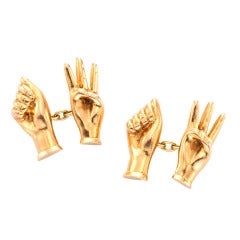PAUL FLATO A Pair of Gold Sign-Language Cufflinks