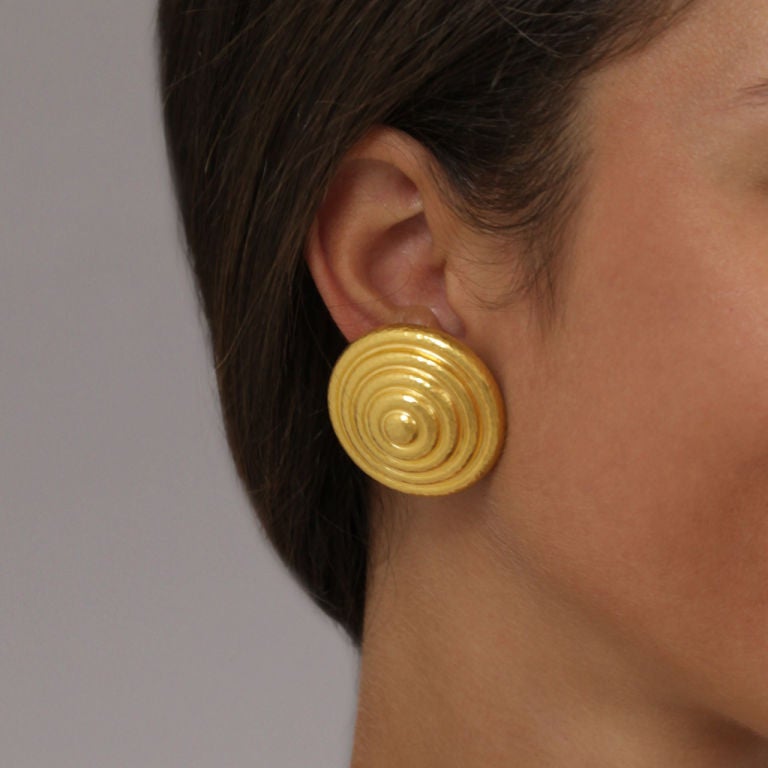 Big and bold gold! These high karat gold earrings by Ilianis Lalaounis have a fearless, outspoken style. Redolent of the seventies, they have an ethnic feel with an urban vibe. The quality of the fabrication is superb.<br />
<br />
Noted: They