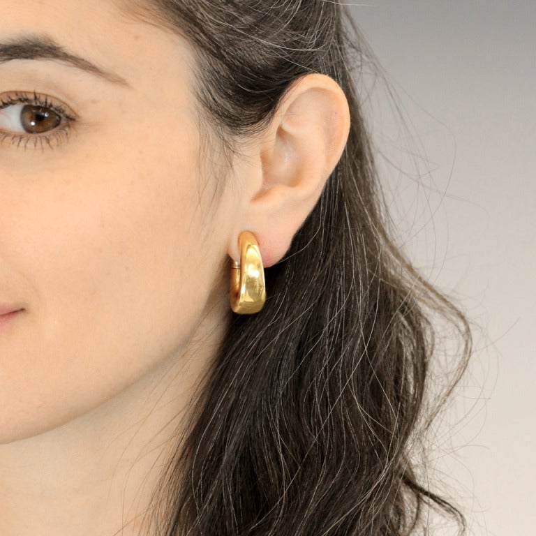 Ever tasteful, Pomellato imbues each piece with that something extra. These hoops have an unusual architecture that makes them both wearable and stylistically remarkable. These are made as clips, they do not have posts. Excellent