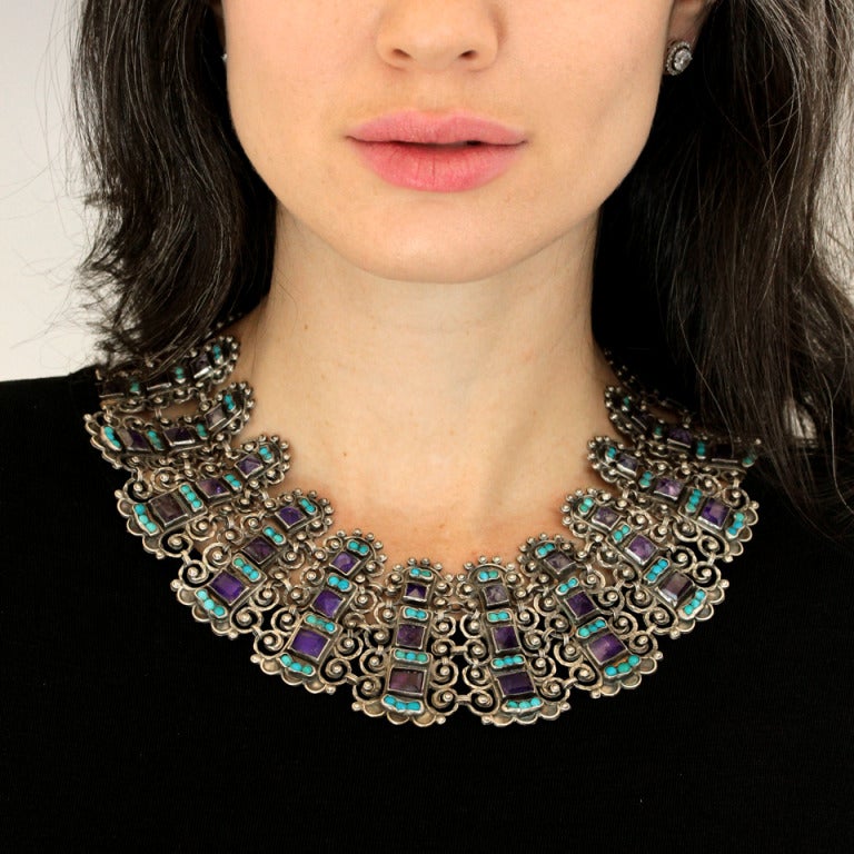 Renowned as one of Mexico's most unique designers, Matilde Poulat's work is highly recognizable. This well-known necklace embodies the intricate detail that personifies her style. Its overall look is a richly colored collar, underscored by complex