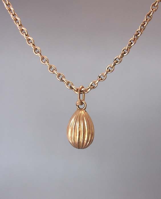 Russian Empire Russian Reeded Gold Easter Egg Pendant, circa 1910