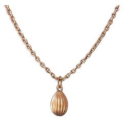 Russian Reeded Gold Easter Egg Pendant, circa 1910