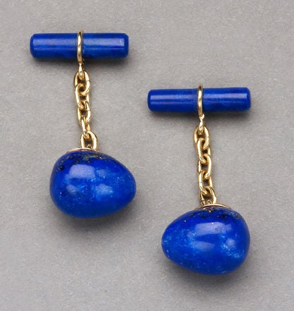 Based on a Fabergé design from 1880 by the firm's head workmaster, Erik Kollin, the well-matched deep blue lapis links recall fine Siberian specimens of the 19th century. Each egg and lapis bar link is hand polished and joined together by a small