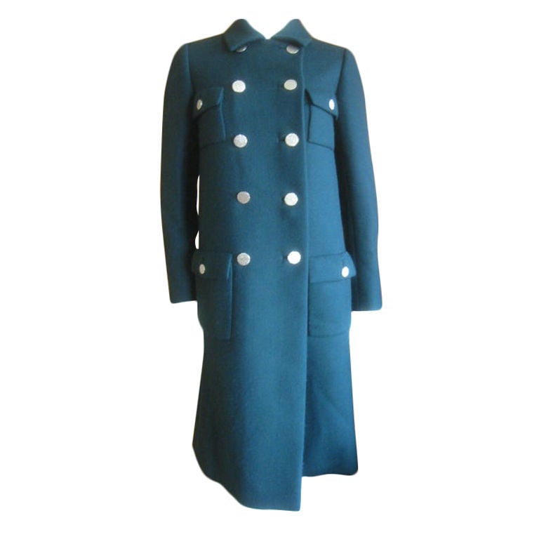 Green wool Military coat from Norman Norell<br />
lining has issues see details below<br />
<br />
Bust 39