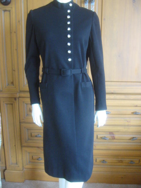 Norell gorgeous belted black dress w 20 Swarovski crystal buttons<br />
<br />
Bust 38