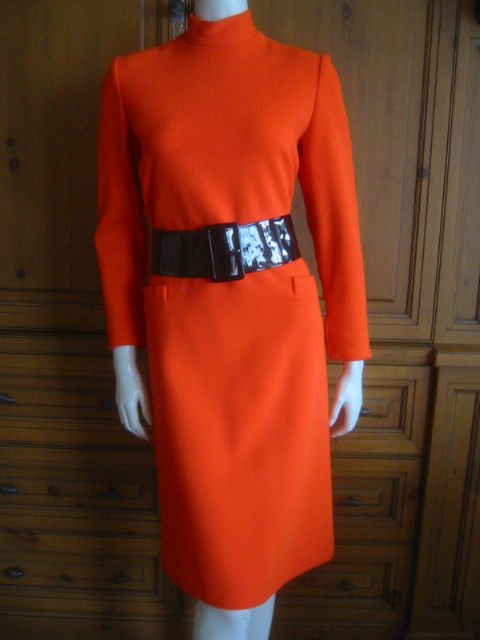 Orange  dress with wide patent leather belt from Norman Norell<br />
<br />
Bust 38