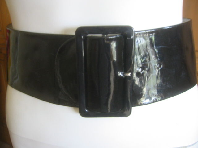 Wide black patent leather belt from Norman Norell<br />
<br />
The Norell collection of Beverly Bettner<br />
This remarkable collection of over 150 ensembles by Norman Norell reflect both the unerring tailoring of Norell, but also the curatorial