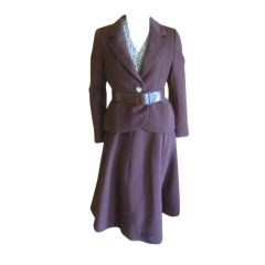 Vintage Norell four piece suit with sexy wrap top