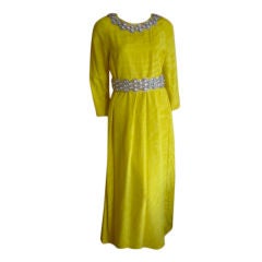 Norell yellow moire silk gown with jewel collar and belt