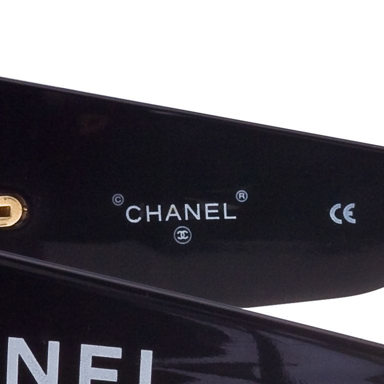 chanel sunglasses written on side