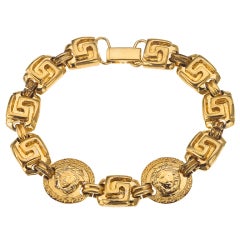 Gianni Versace gold toned bracelet with Medusa and Greca For Sale at ...