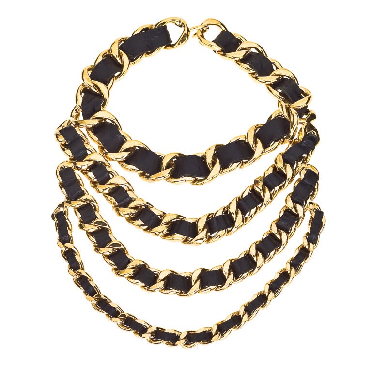Extremely rare Chanel massive signature black/gold 4 row chain necklace.

Necklace length 16 inches 
Chain drop 5.5 inches