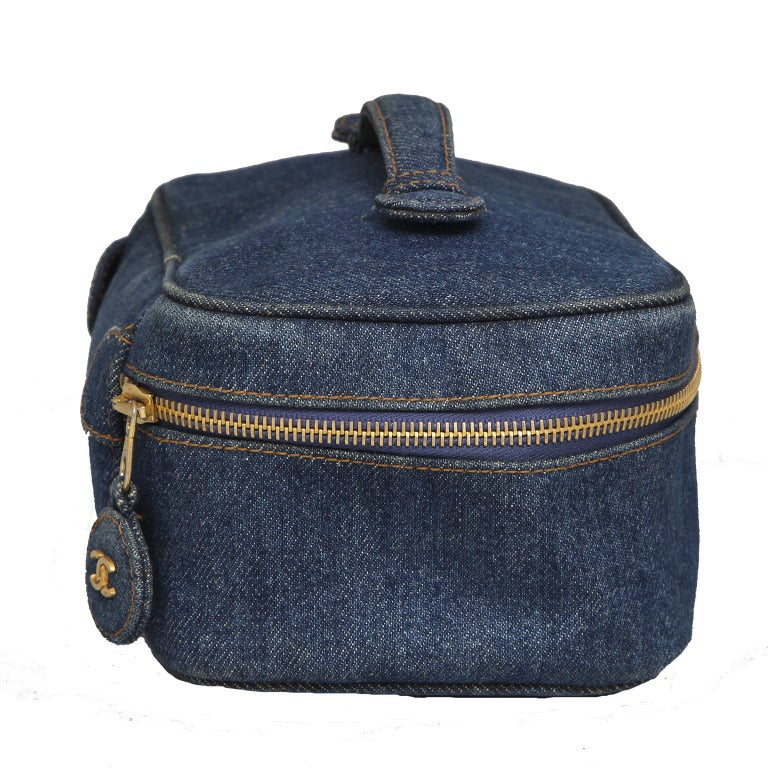 Chanel Denim Vanity Case Bag.

Specifications: Height: 4, Width: 8, Depth 6 inches
Handle Drop: 1 inch