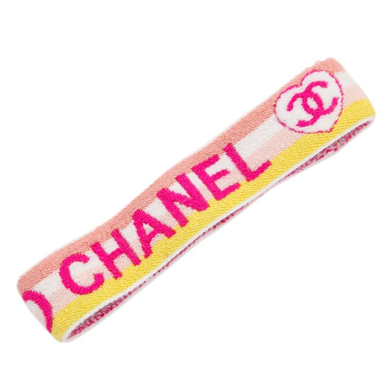 Chanel headband with Coco Chanel logos.