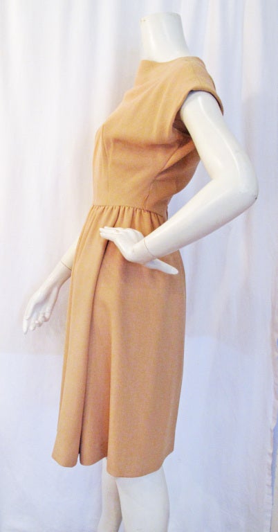 Please contact dealer prior to purchase for White Glove shipping options.

Simply Adorable TEAL TRAINA 1960'S CAMEL DRESS