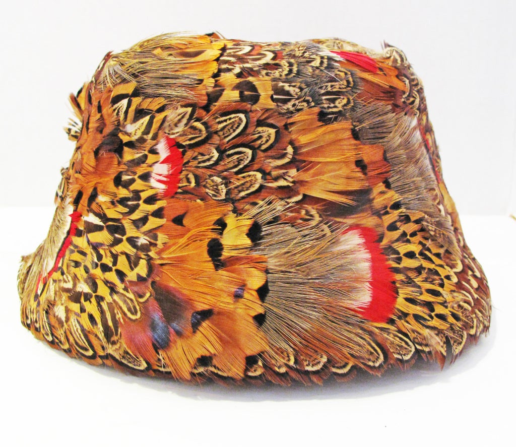 Please contact dealer prior to purchase for White Glove shipping options.

QUALITY HOUSE Pheasant Feather Hat. Slight brim, beautifully colored feathers