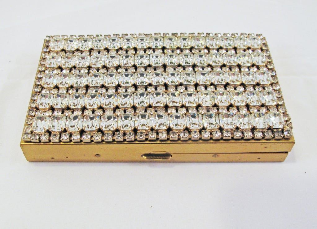 Please contact dealer prior to purchase for White Glove shipping options.

Rhinestone and Gold Tone Vintage Compact Clutch