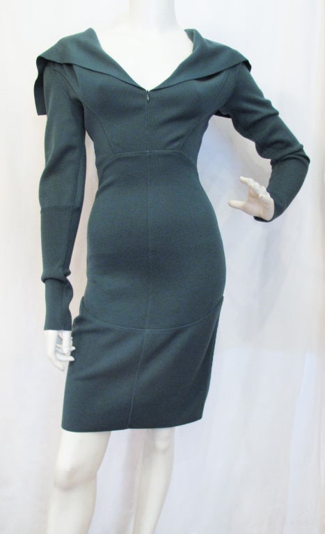 Please contact dealer prior to purchase for White Glove shipping options.

Azzedine Alaia Teal Seamed Wool Dress With Caped Neckline and Front Zipper. Marked a size Small. Excellent Condition. Measurements are taken flat. Dress has give.