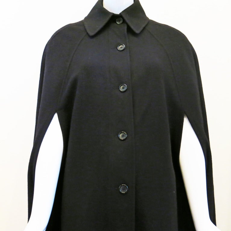 Please contact dealer prior to purchase for White Glove shipping options.

1970s Giorgio Sant'Angelo Black Wool Full Length Cape

Size S-M (Please see measurements)