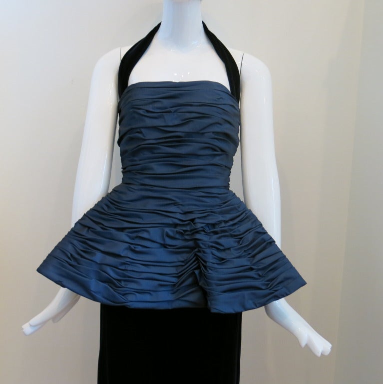 Please contact dealer prior to purchase for White Glove shipping options.

1980s Victor Costa Navy Ruched Peplum Velvet Gown with Detachable Halter Strap