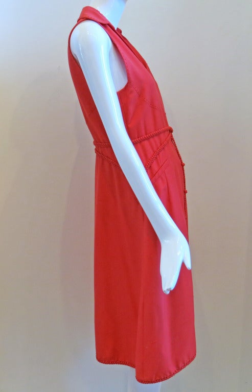 Ralph Rucci Chado Coral Cutout Back Dress with braided buttons and belting details. Has original Neiman Marcus Price Tag for $4,000. Marked a size 8, please check measurements. Excellent Condition.

Please contact dealer prior to purchase for
