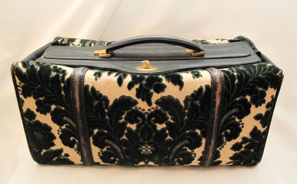 Blue leather, green & cream tapestry bag.<br />
<br />
We believe wholeheartedly that this is a KORET bag. It also might be Gucci, but we are selling it as pictured as it does not have a label. <br />
<br />
Small zippered pocket on interior.