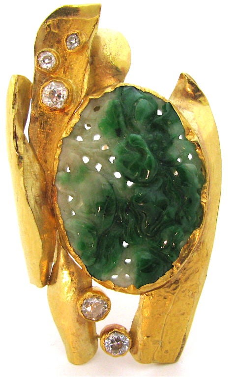 A stylish gold, diamond and jadite pendant/brooch by Janiye of Boston.  The 2 1/2