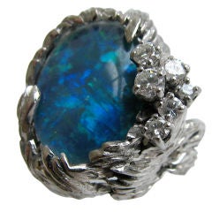 GILBERT ALBERT An Opal Diamond and Gold Ring