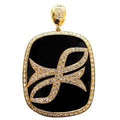 A French Gold , Diamond and Onyx Pisces Pendant