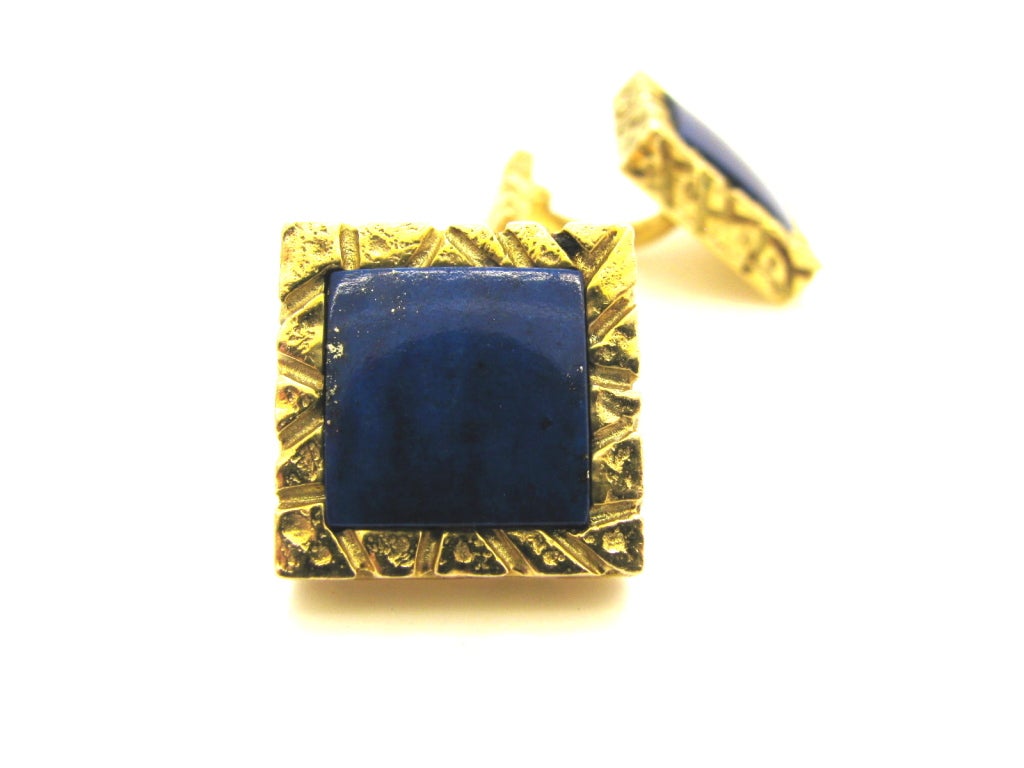 A smart pair of gold and lapis cufflinks. The 3/4