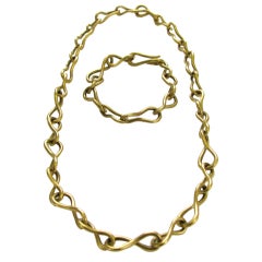 ANGELA CUMMINGS  , A Gold Link Necklace/Bracelet Combination