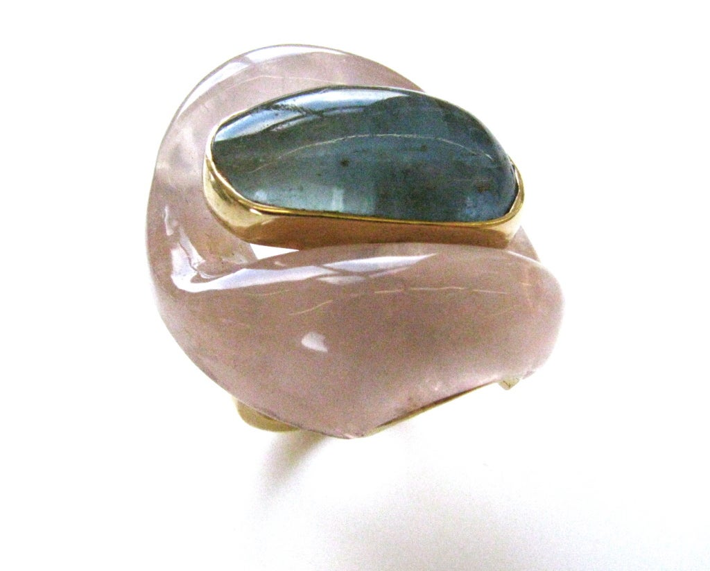 A Stylish rose quartz and aquamarine ring by Patricia Schepps Vail for Seaman Schepps. The 1 1/2