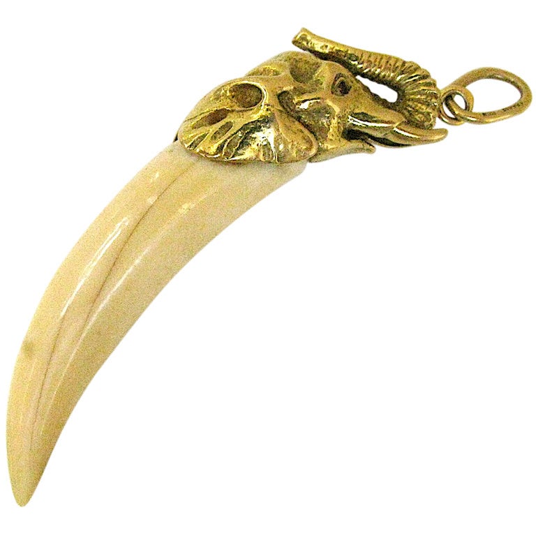 A French Ivory and Gold Tusk Pendant