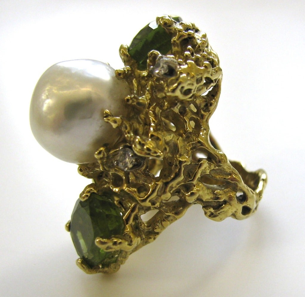 A Dramatic 18k south sea pearl and peridot ring by Barbara Anton. The 2