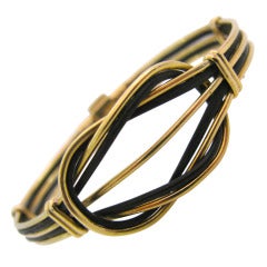 A Gold and Elephant Hair Love Knot Bracelet