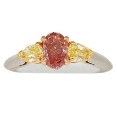 Fancy Deep Pink 0.80 CT. Oval Diamond Ring
