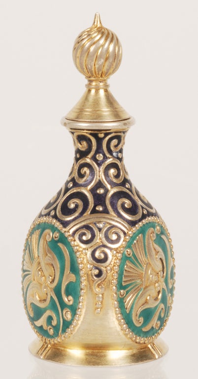 An extremely rare Faberge silver gilt and pan-Slavic style cloisonne enamel gum-pot, Moscow, 1908-1917. Flask shape cast and chased art nouveau design with matte teal enamel. 88 silver standard, with its original scratched inventory number 22750.